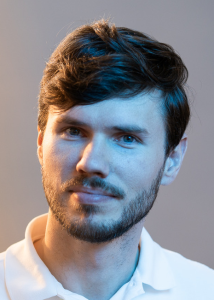 A professional headshot of Shaun Olafson.