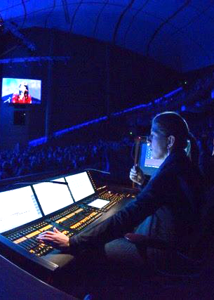 Sharon Huizinga working with lighting at a theatre in Moscow