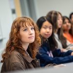 Students look on during a class.